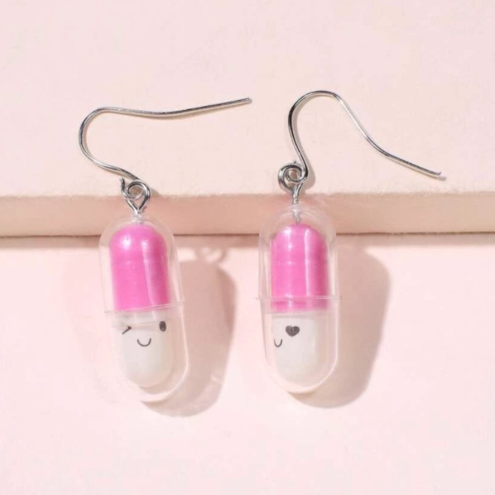 Pink pill capsule happy earrings
